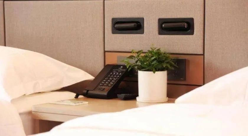 Bed in GreenTree Inn Suzhou Industrial Zone Yangcheng Lake Weiting Mong Kok Express Hotel