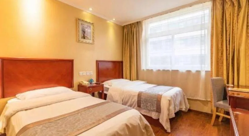 Bed in GreenTree Inn West Railway Station North Square Hotel