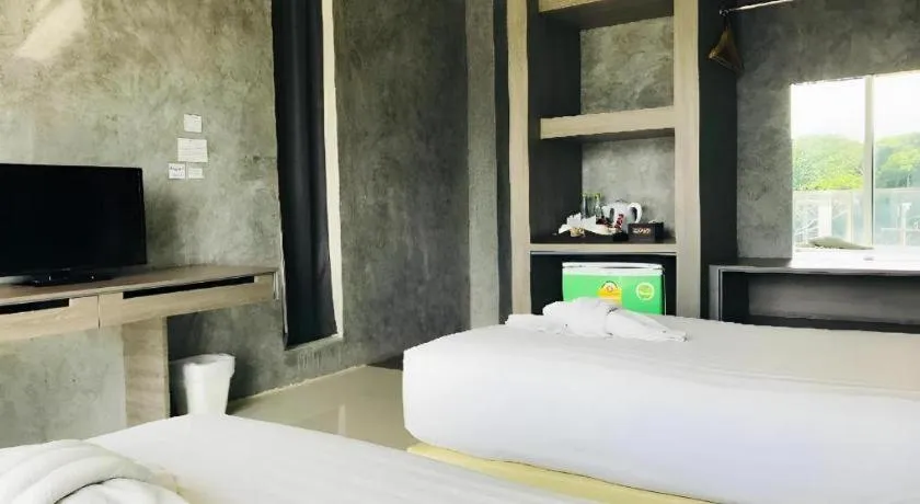 Bed in The Peak Boutique Hotel