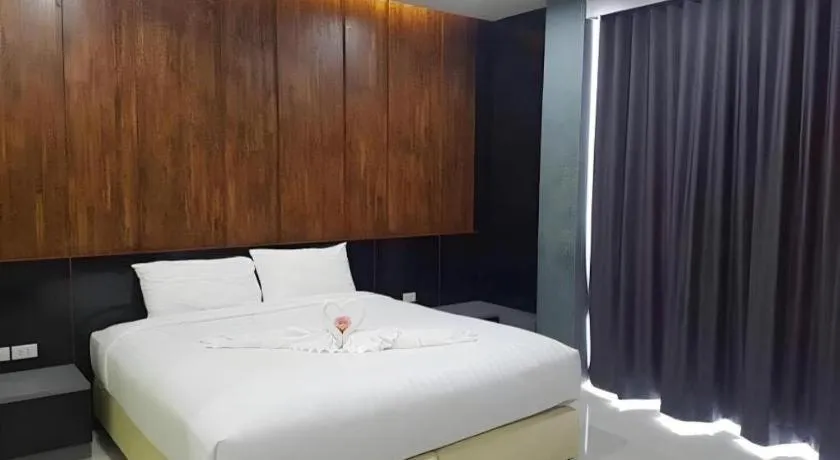 Bed in The Peak Boutique Hotel