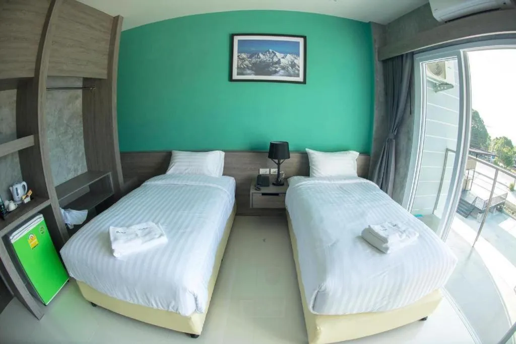 Bed in The Peak Boutique Hotel