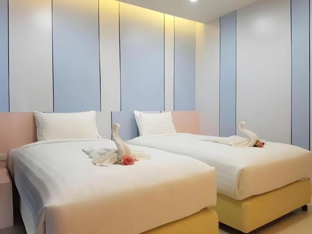 Bed in The Peak Boutique Hotel