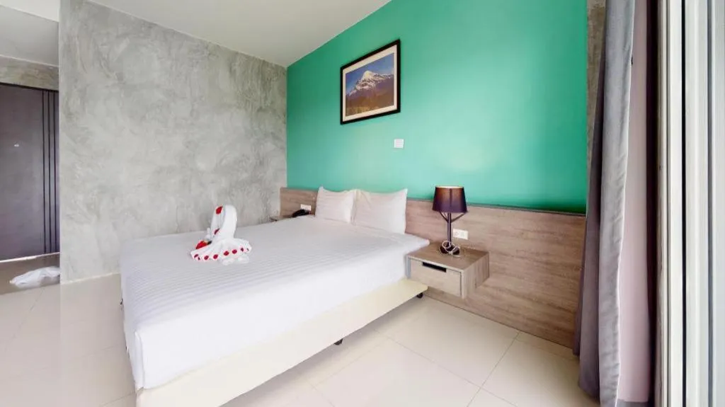 Bed in The Peak Boutique Hotel