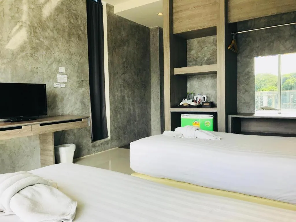 Bed in The Peak Boutique Hotel