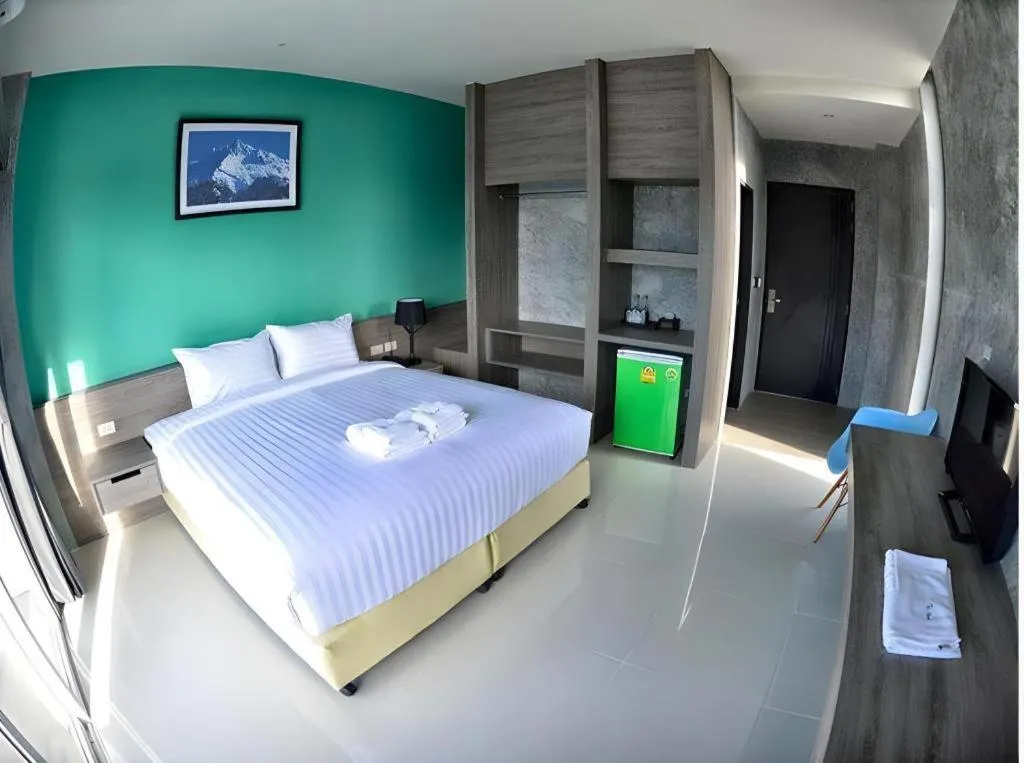 Bed in The Peak Boutique Hotel