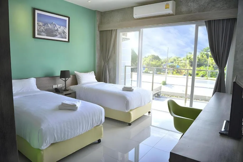 Bed in The Peak Boutique Hotel