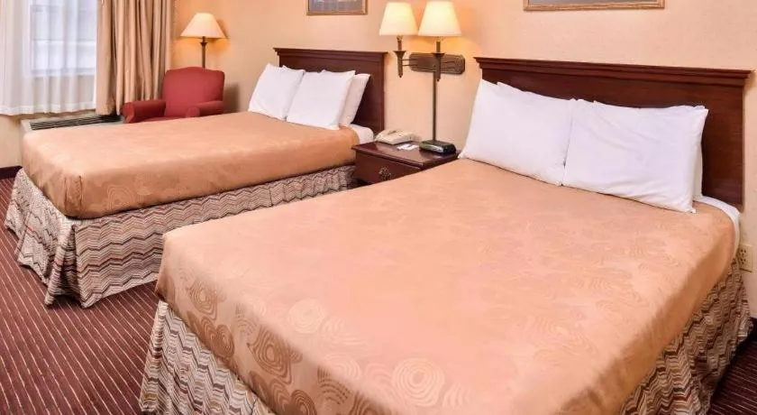 Bed in Americas Best Value Inn Alliance