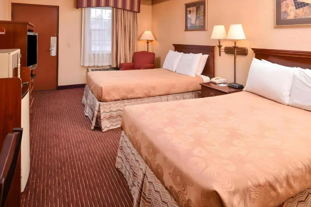 Bed in Americas Best Value Inn Alliance