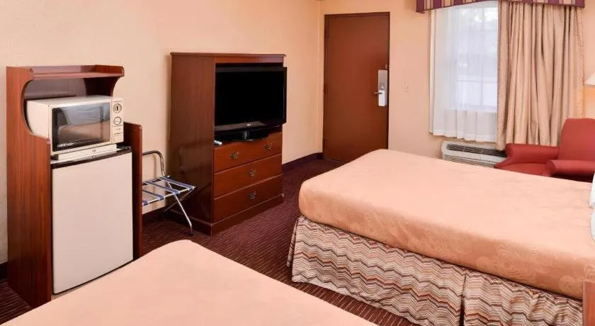 Bed in Americas Best Value Inn Alliance