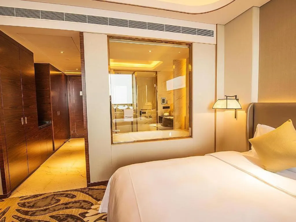 Bed in Wyndham Grand Plaza Royale Huayu Chongqing