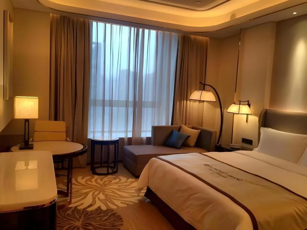 Bed in Wyndham Grand Plaza Royale Huayu Chongqing
