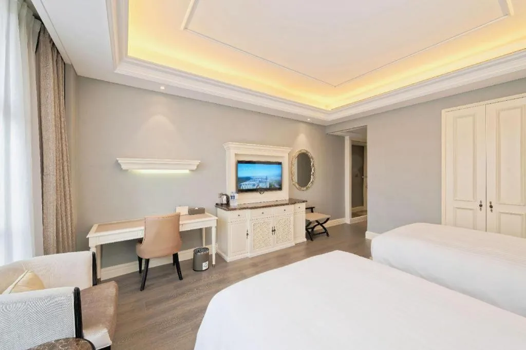 Bed in Yin Run Jin Jiang Castle Hotel