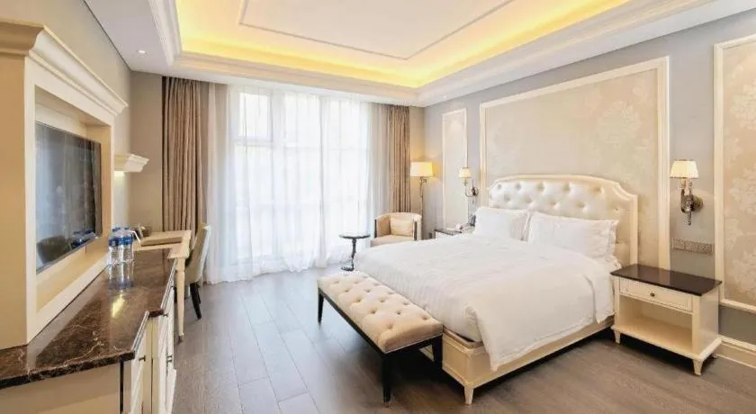 Bed in Yin Run Jin Jiang Castle Hotel