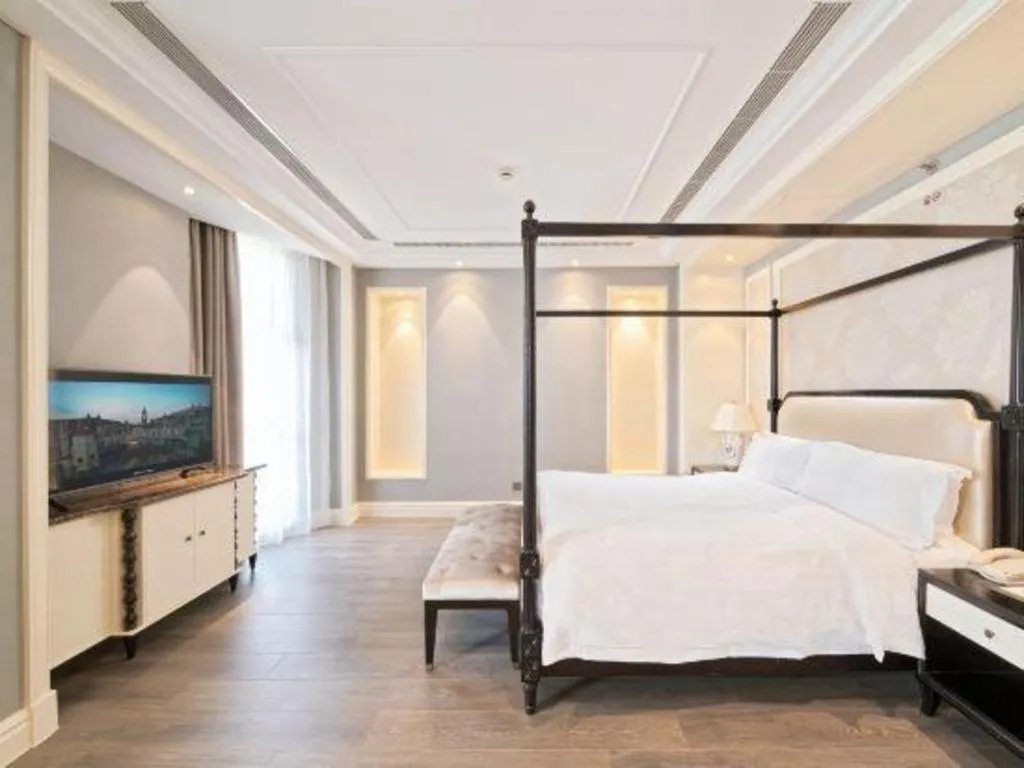 Bed in Yin Run Jin Jiang Castle Hotel