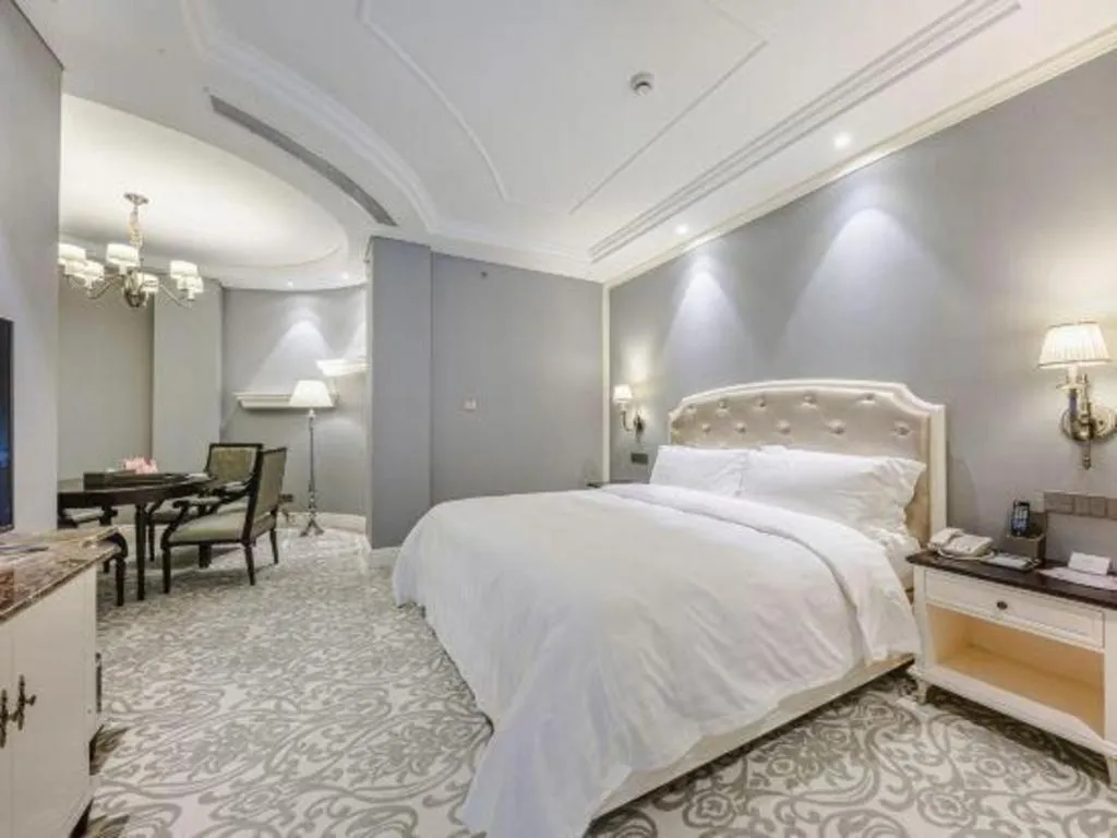 Bed in Yin Run Jin Jiang Castle Hotel