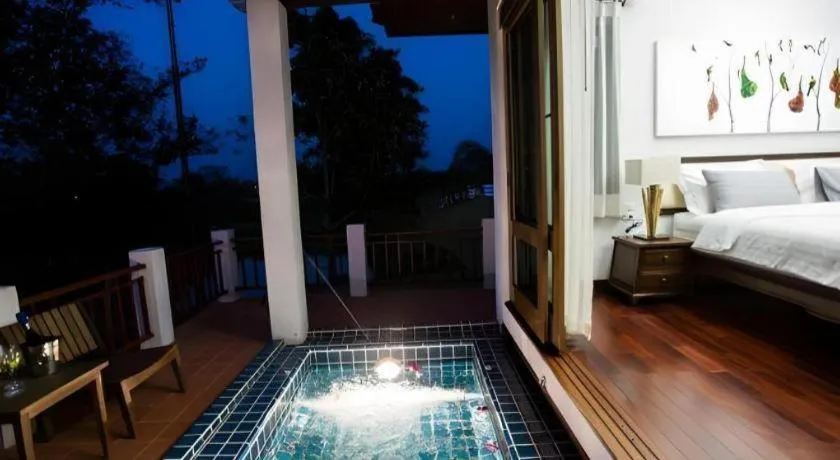 Bed in Doltara Boutique Resort