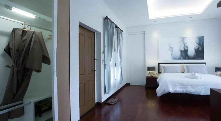 Bed in Doltara Boutique Resort