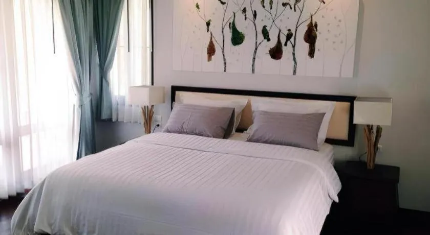 Bed in Doltara Boutique Resort