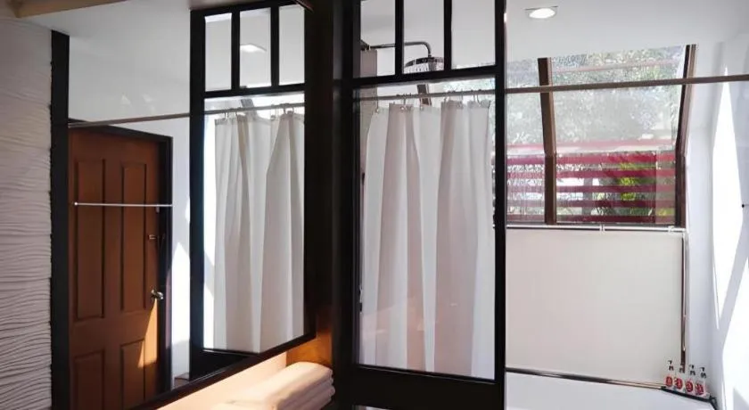 Bed in Doltara Boutique Resort