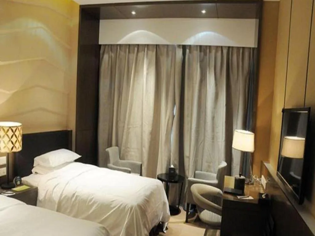 Bed in Urumqi Tianyuan Hotel