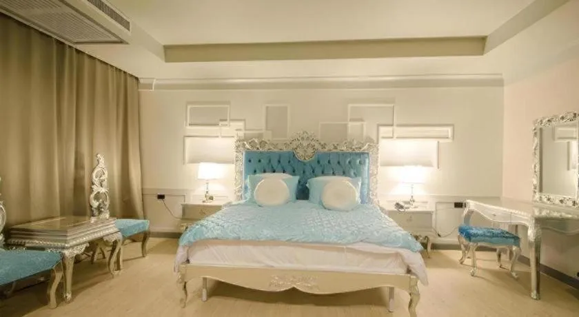 Bed in Alvarez Hotel