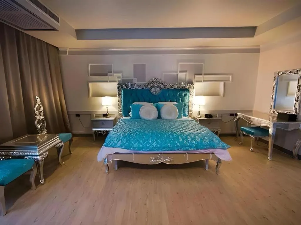 Bed in Alvarez Hotel