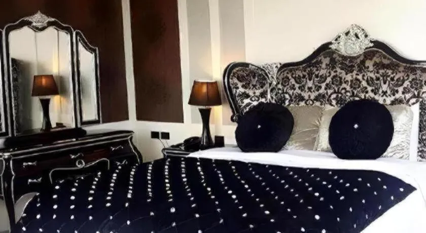 Bed in Alvarez Hotel