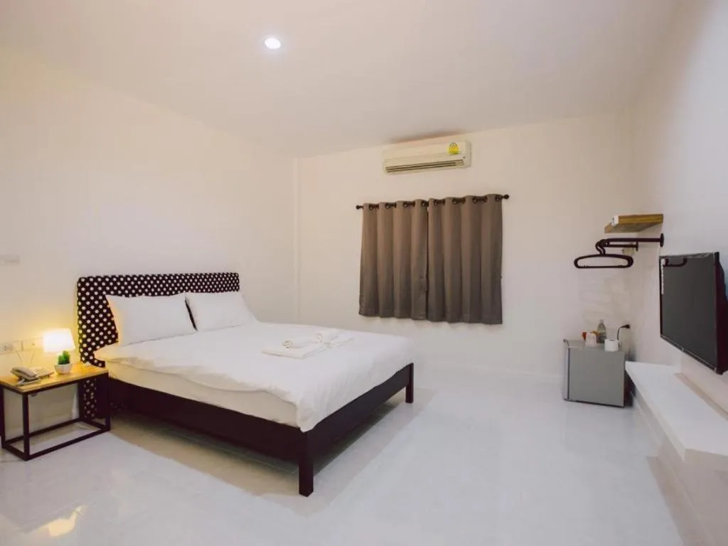 Bed in Maalamaii Hotel