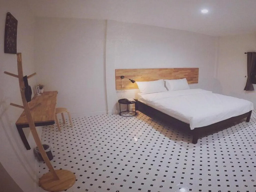 Bed in Maalamaii Hotel