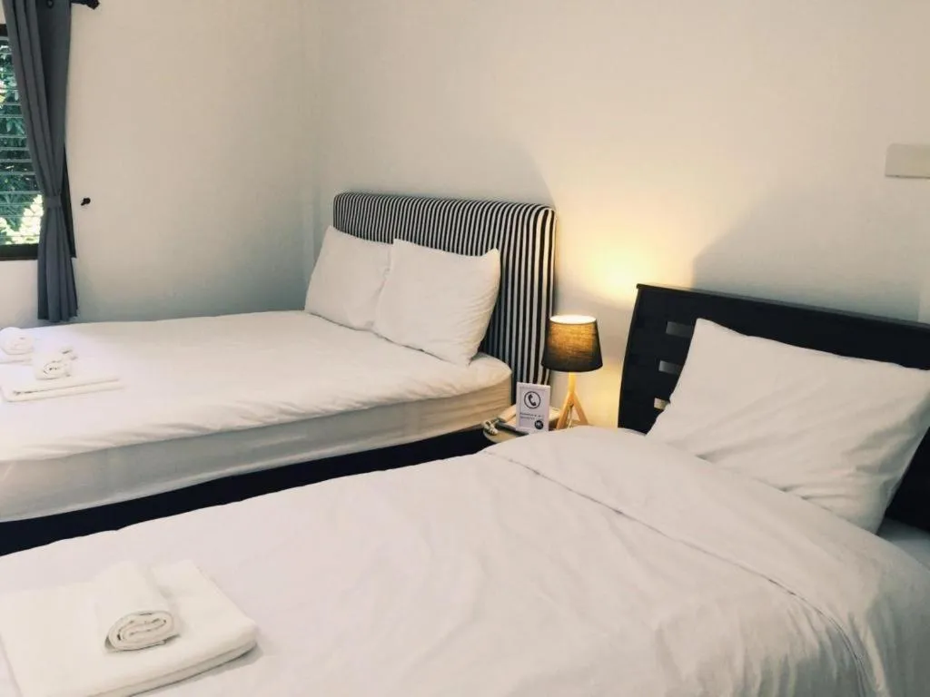 Bed in Maalamaii Hotel