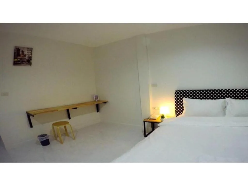 Bed in Maalamaii Hotel