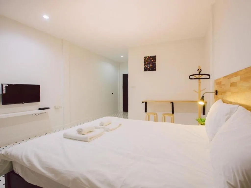 Bed in Maalamaii Hotel