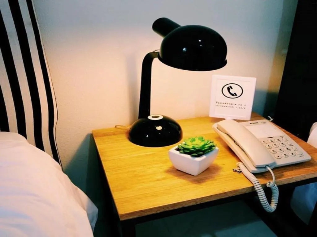 Bed in Maalamaii Hotel