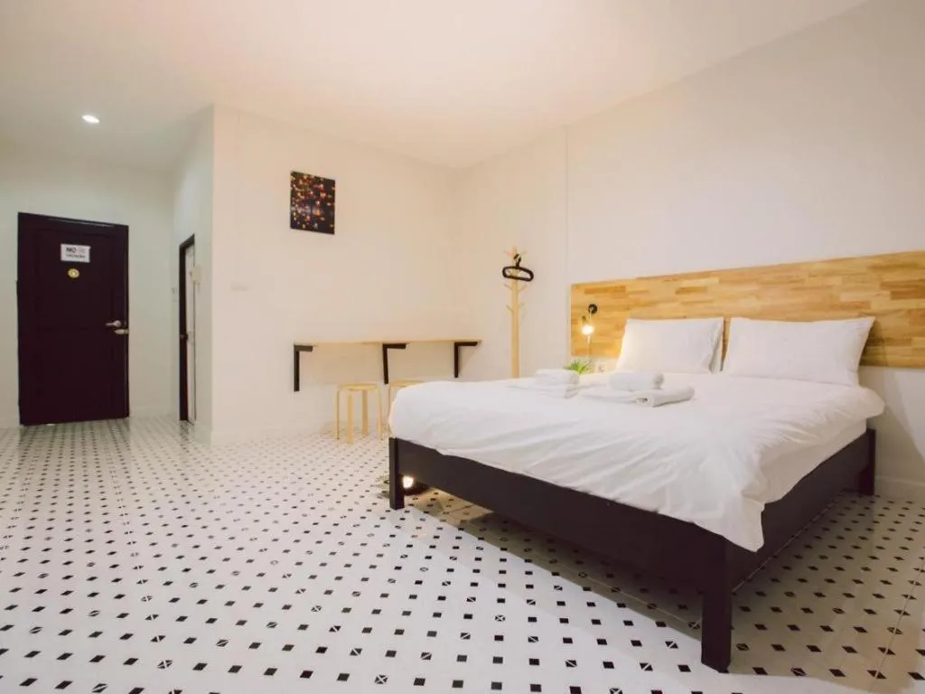 Bed in Maalamaii Hotel