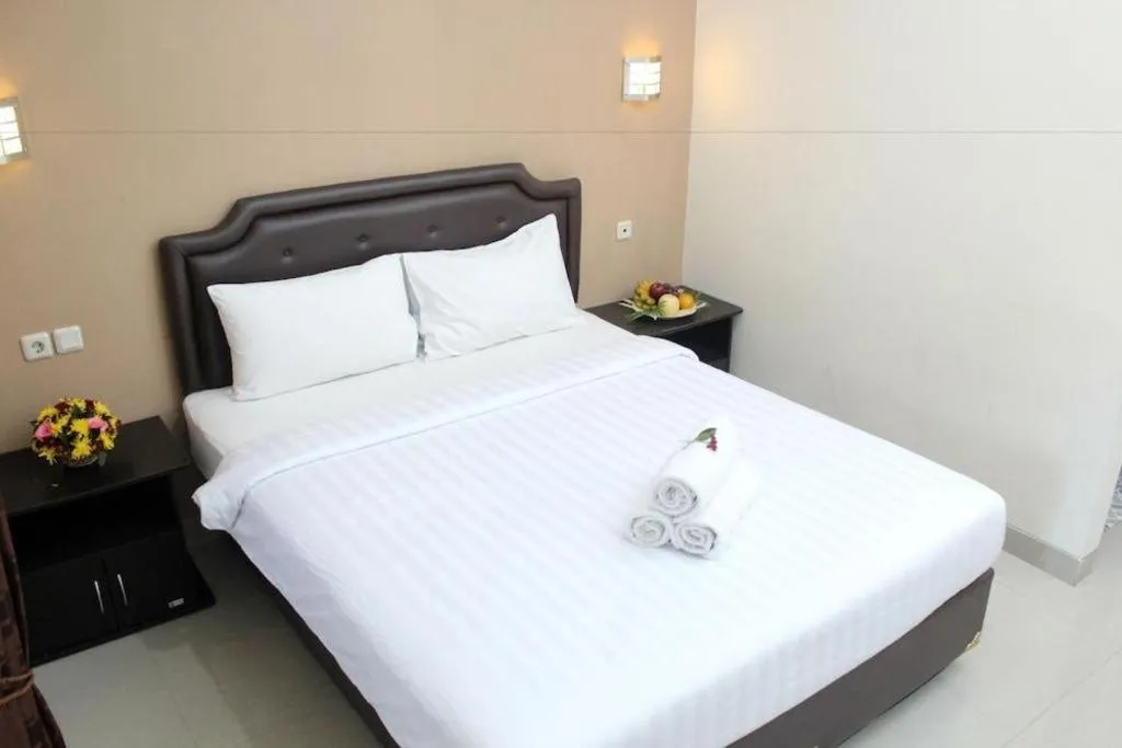 Bed in Malioboro Garden Hotel Yogyakarta