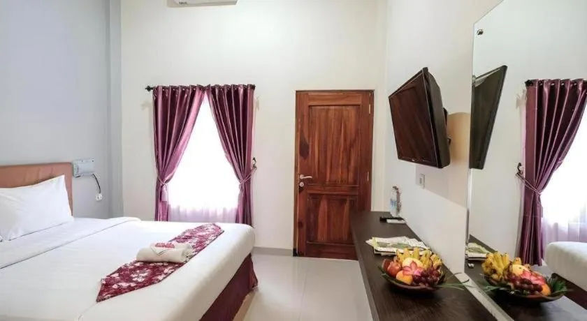 Bed in Malioboro Garden Hotel Yogyakarta