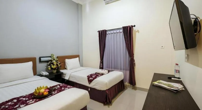 Bed in Malioboro Garden Hotel Yogyakarta