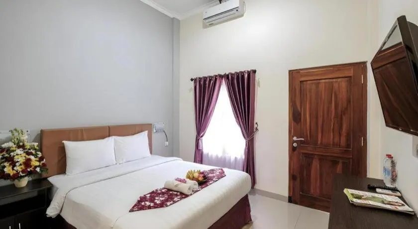 Bed in Malioboro Garden Hotel Yogyakarta