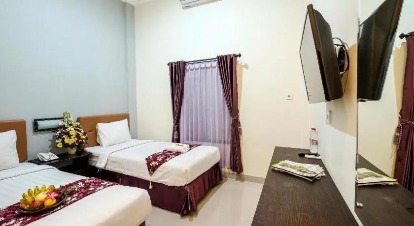 Bed in Malioboro Garden Hotel Yogyakarta