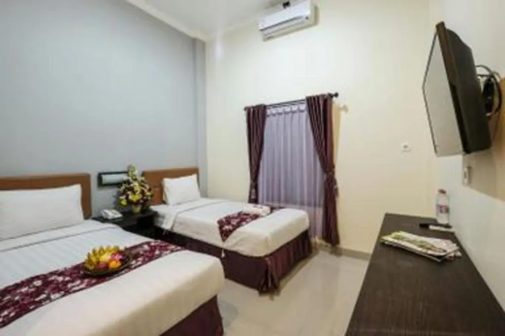 Bed in Malioboro Garden Hotel Yogyakarta