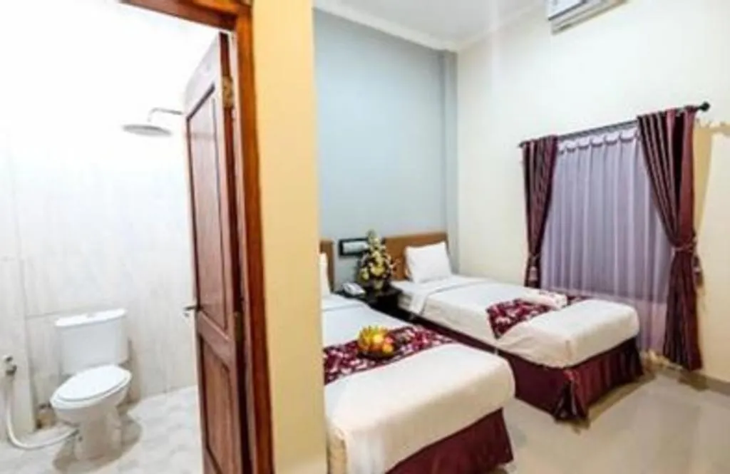 Bed in Malioboro Garden Hotel Yogyakarta