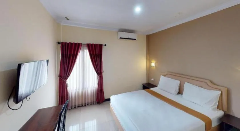 Bed in Malioboro Garden Hotel Yogyakarta