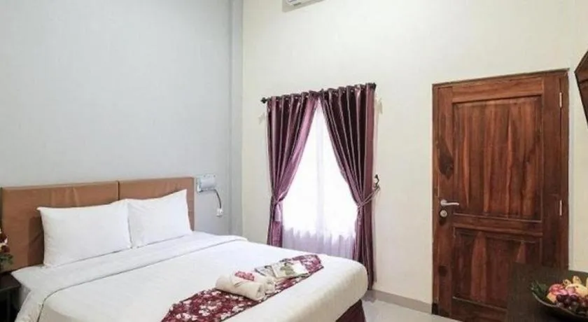 Bed in Malioboro Garden Hotel Yogyakarta