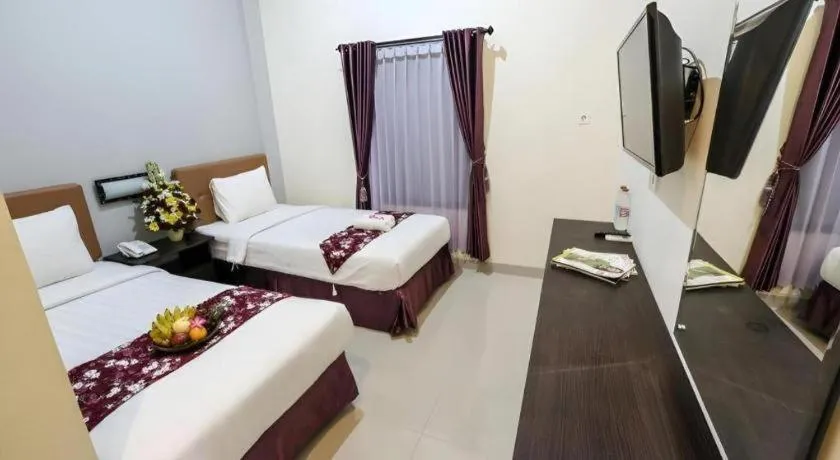 Bed in Malioboro Garden Hotel Yogyakarta