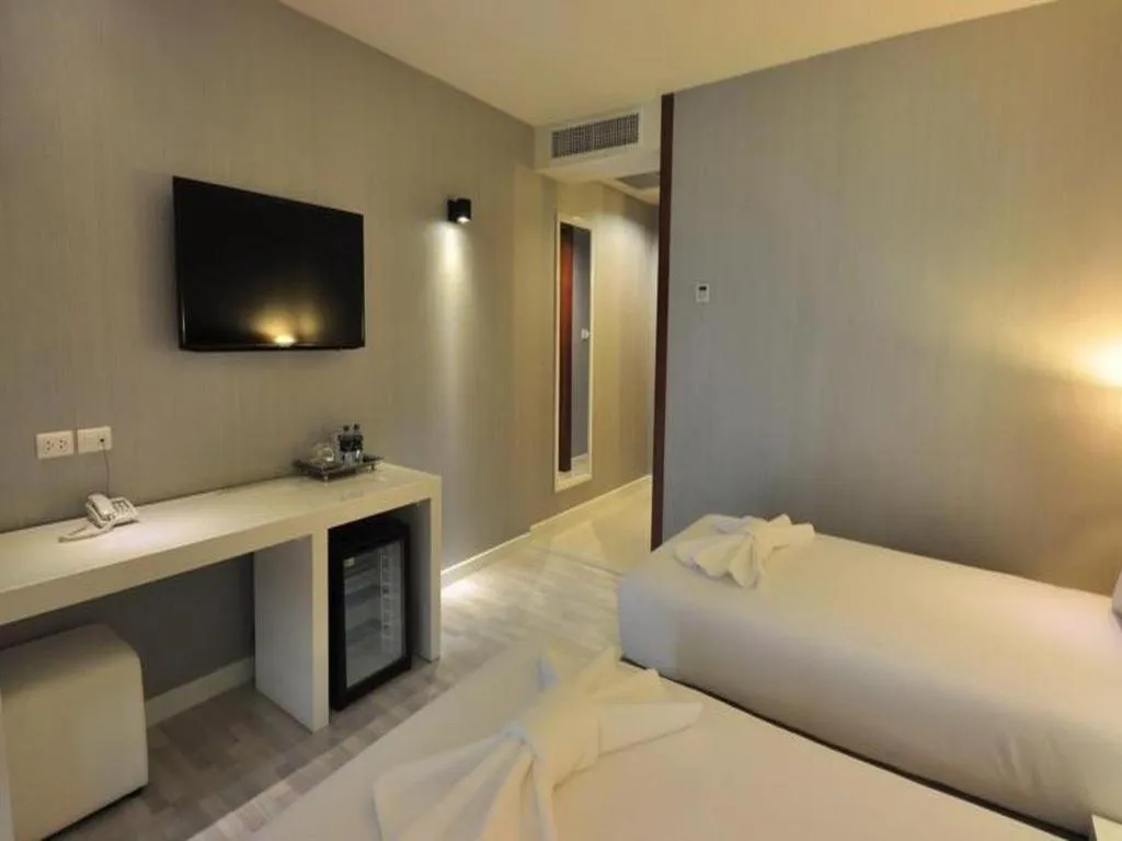 Bed in Tanzeno Hotel