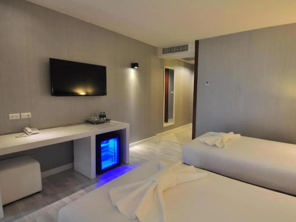 Bed in Tanzeno Hotel