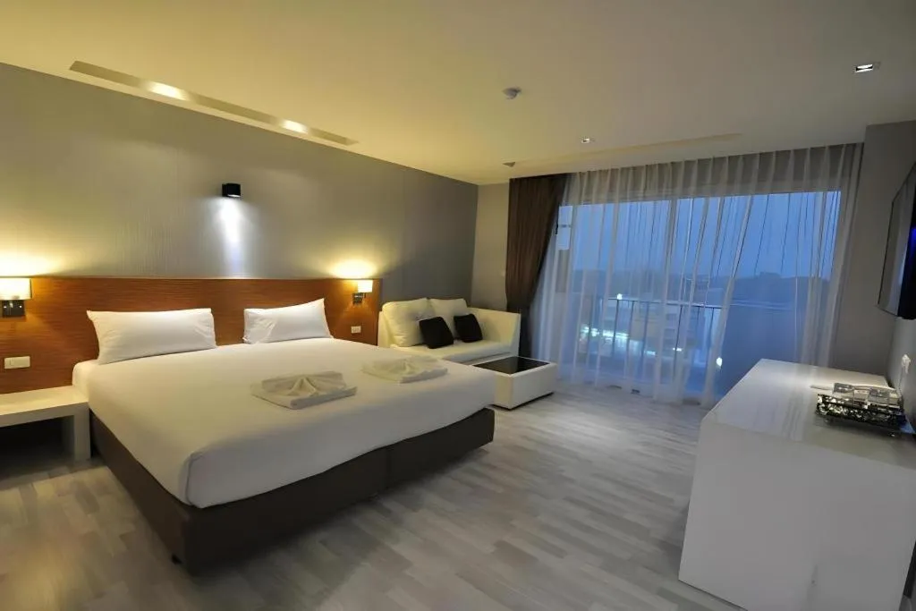 Bed in Tanzeno Hotel