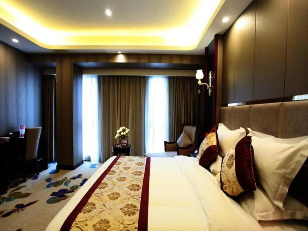 Bed in GreenTree Eastern Zigong Huashang International City Huichuan Road Hotel
