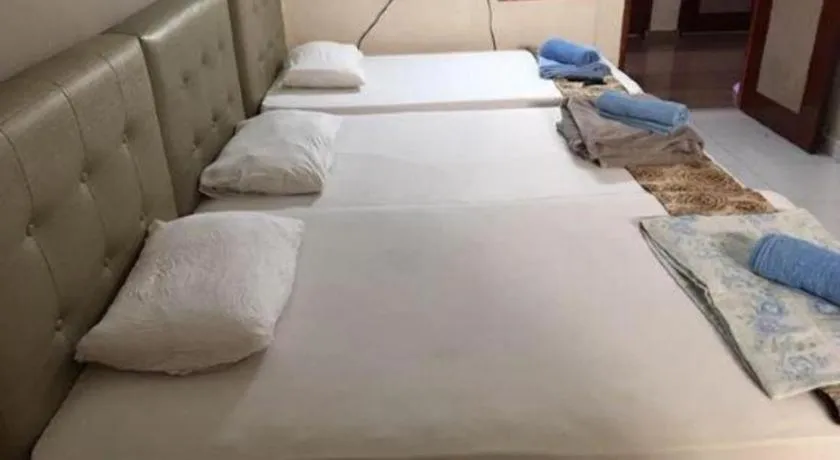 Bed in Lai Ming Hotel Cosmoland