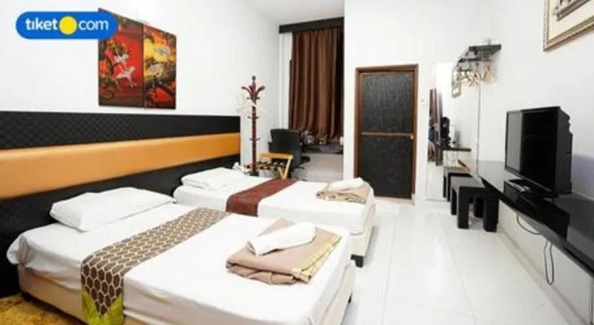 Bed in Lai Ming Hotel Cosmoland